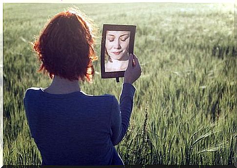 Woman standing on a field.