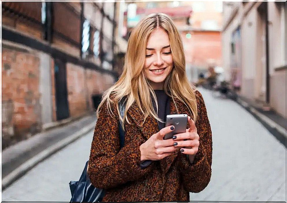 A girl checking her cell phone.