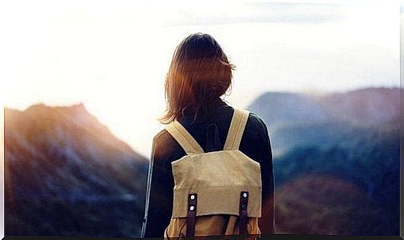 Woman climbing mountains