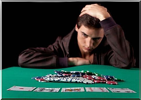 Man sitting at game table.