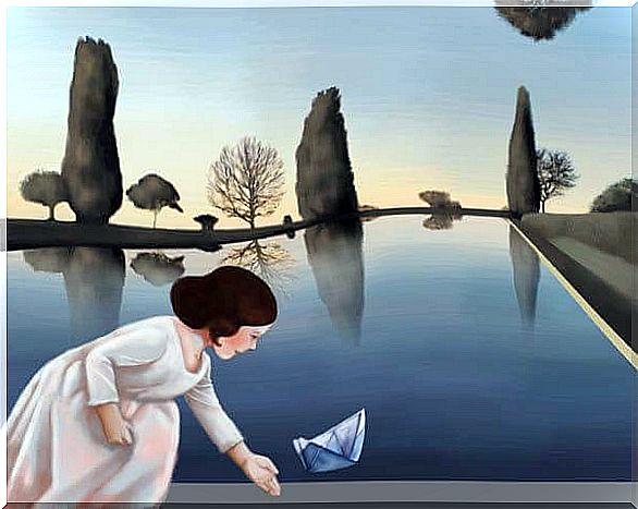 Woman with paper boat