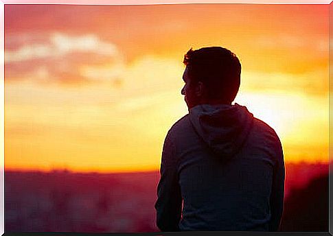 A man watching a sunset