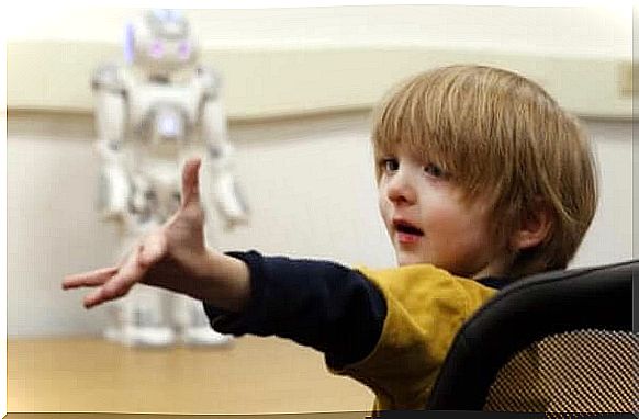 Boy in front of robot