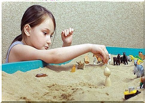 Girl uses the sandbox technique