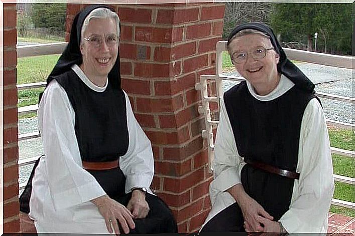 Nuns sitting together.