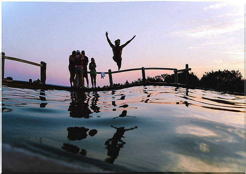 Person jumping in the water.