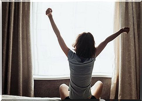 Woman stretching in the morning.