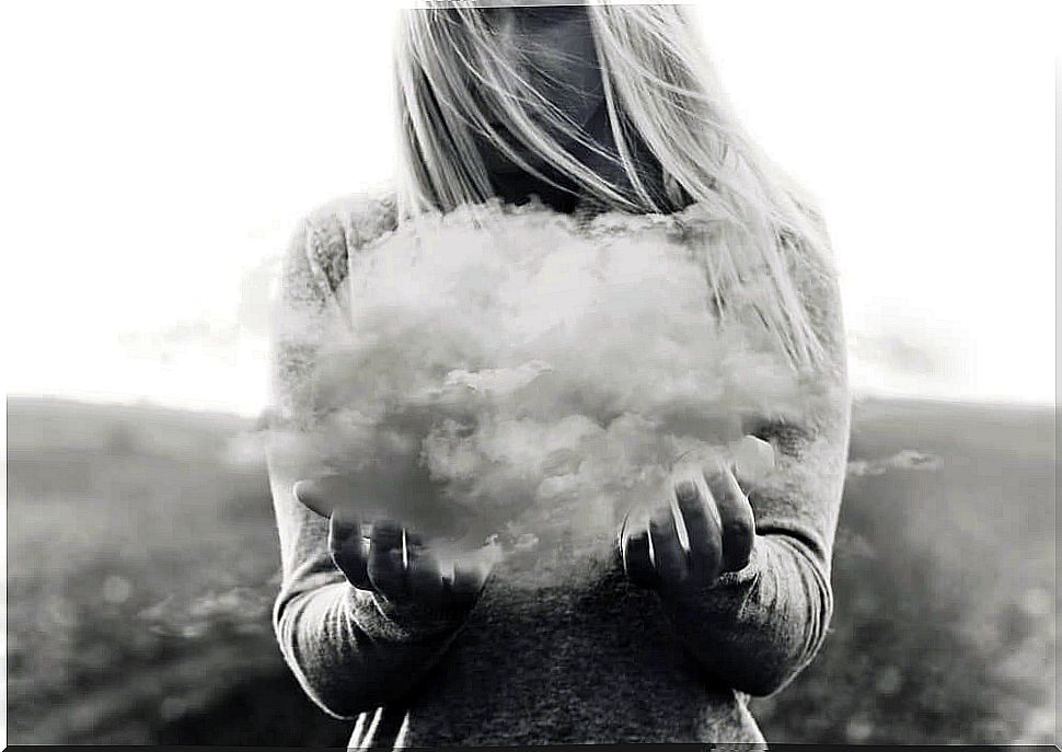 Woman holding a cloud.